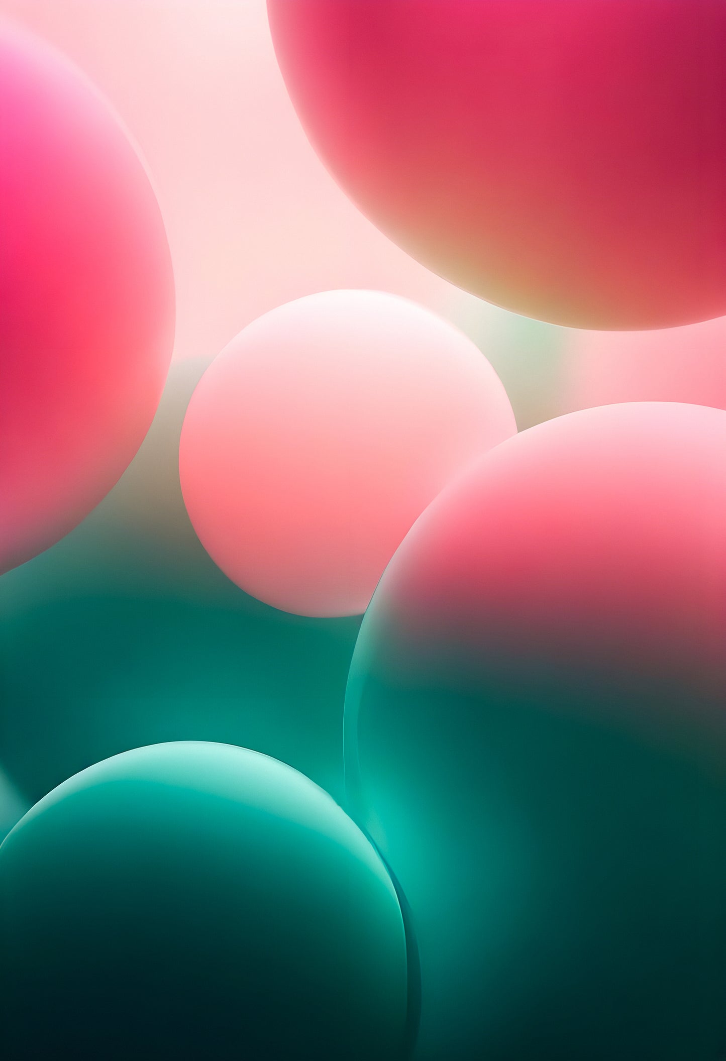 Colorful spheres floating in soft light against a blurred background in pastel shades