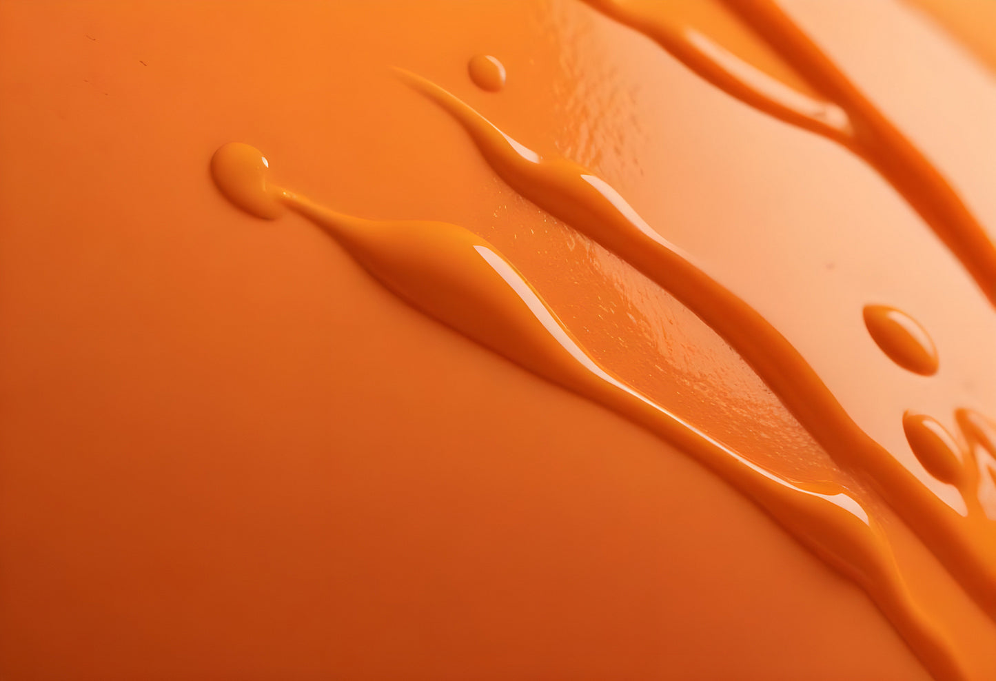 A close-up view of vibrant orange paint dripping on a smooth surface in natural light. Generative AI