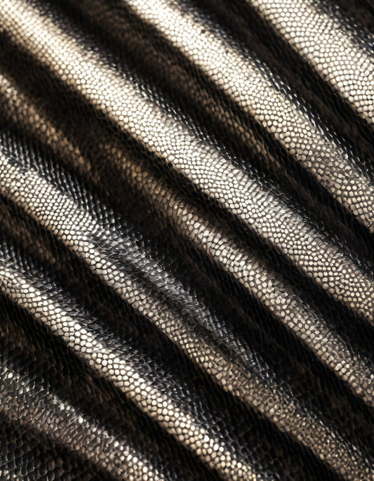 Close-up of textured striped fabric featuring a mix of black and silver tones