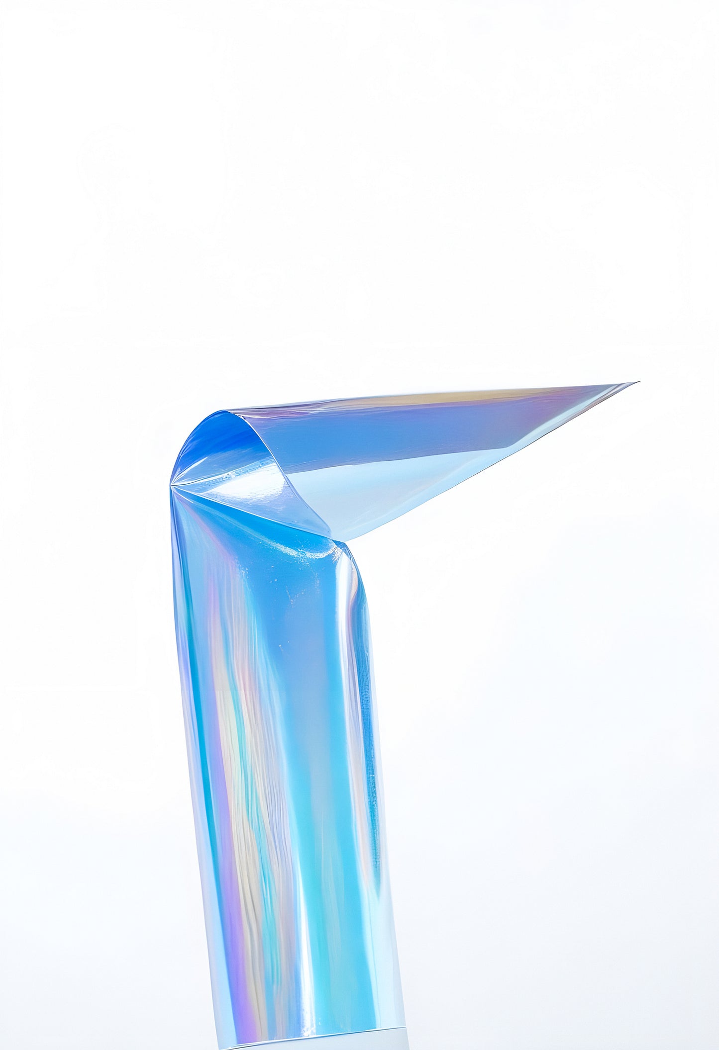 Blue iridescent foil with a glossy finish folded in a triangular shape against a white background