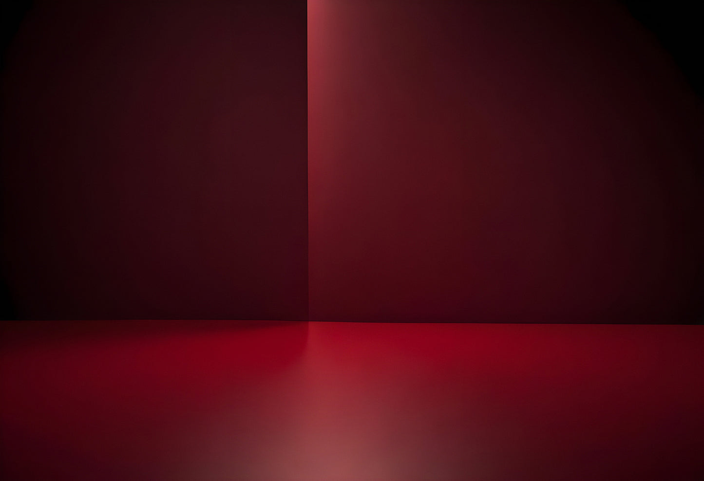 Elegant red backdrop featuring smooth gradient lighting for creative visual projects and presentations