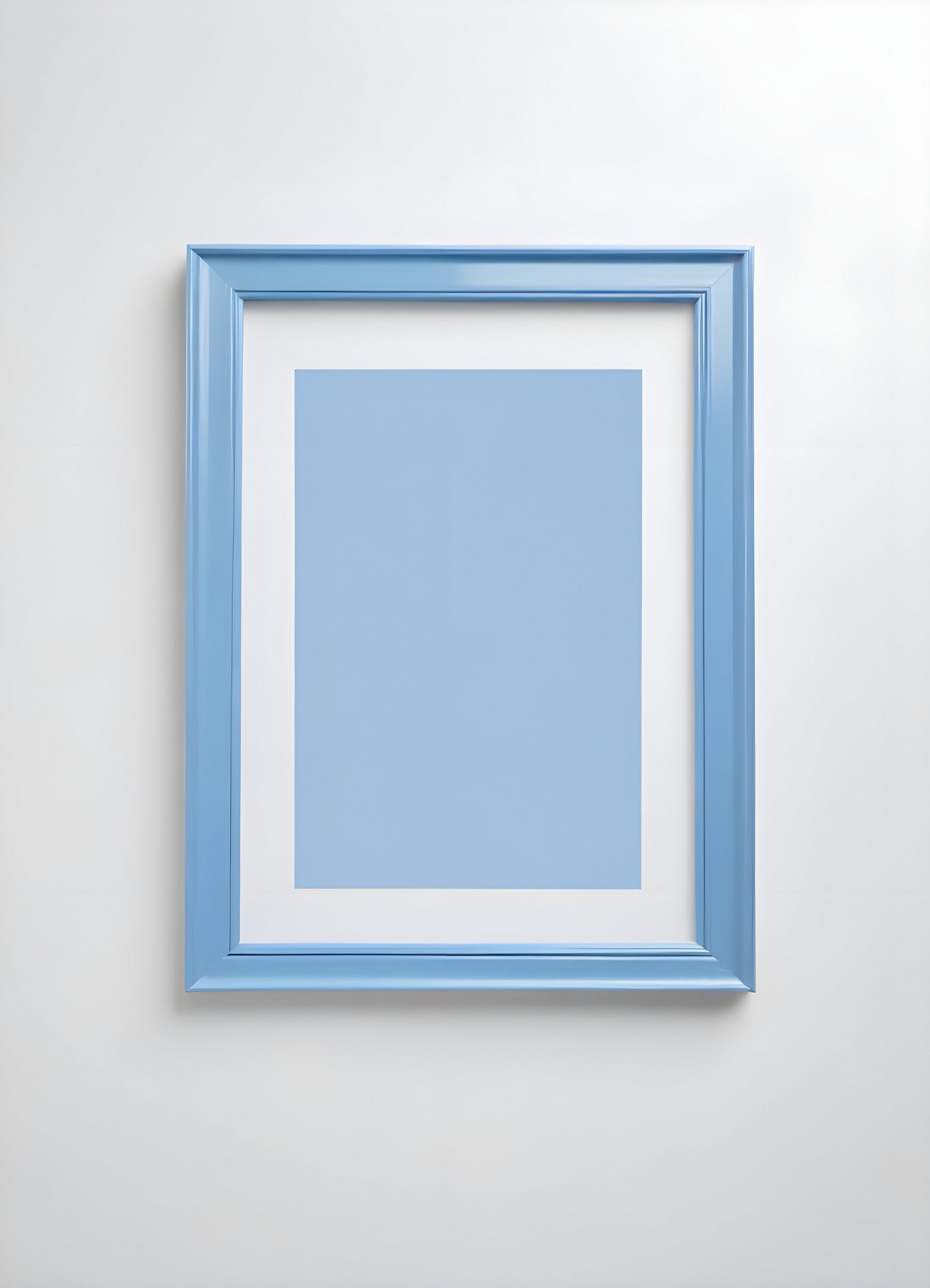 Empty framed blue canvas on a white wall in a minimalist design setting showcasing a modern artistic atmosphere