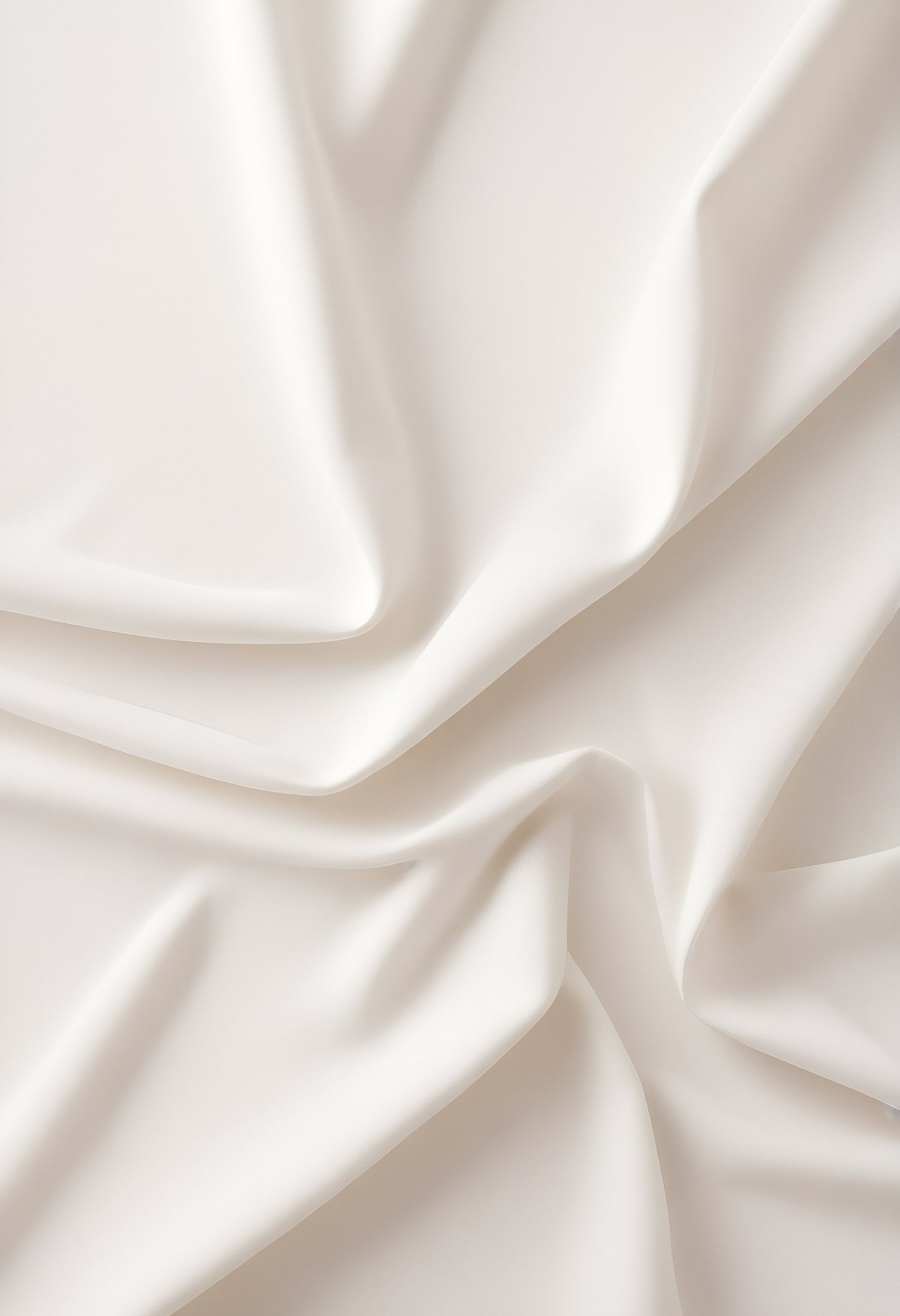 Soft white fabric draped elegantly on a surface