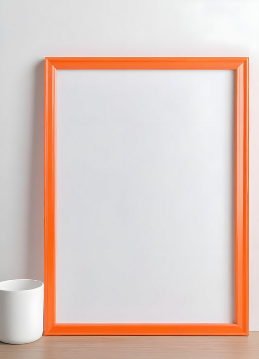 Simple orange picture frame on a white background ready for artwork or photography display in a modern setting