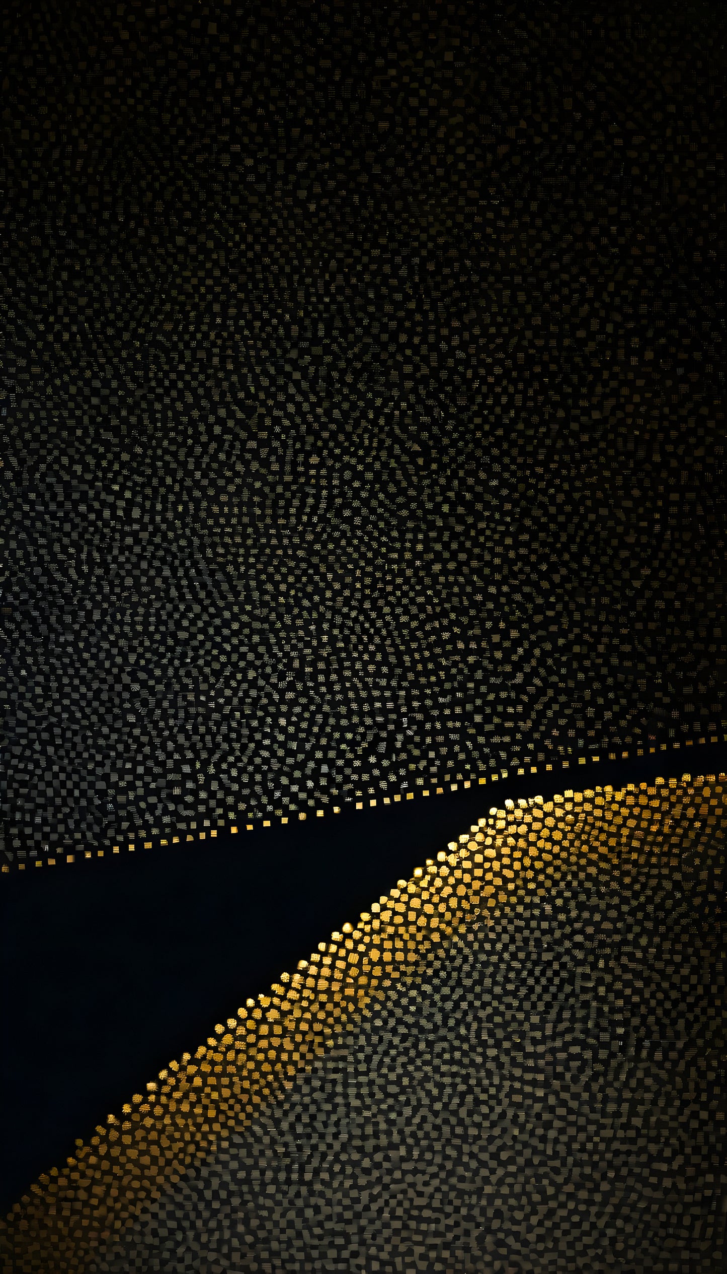 Textured surface with golden highlights against a dark background in an abstract design