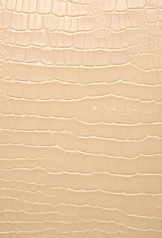 Textured beige alligator leather background showcasing unique patterns and details