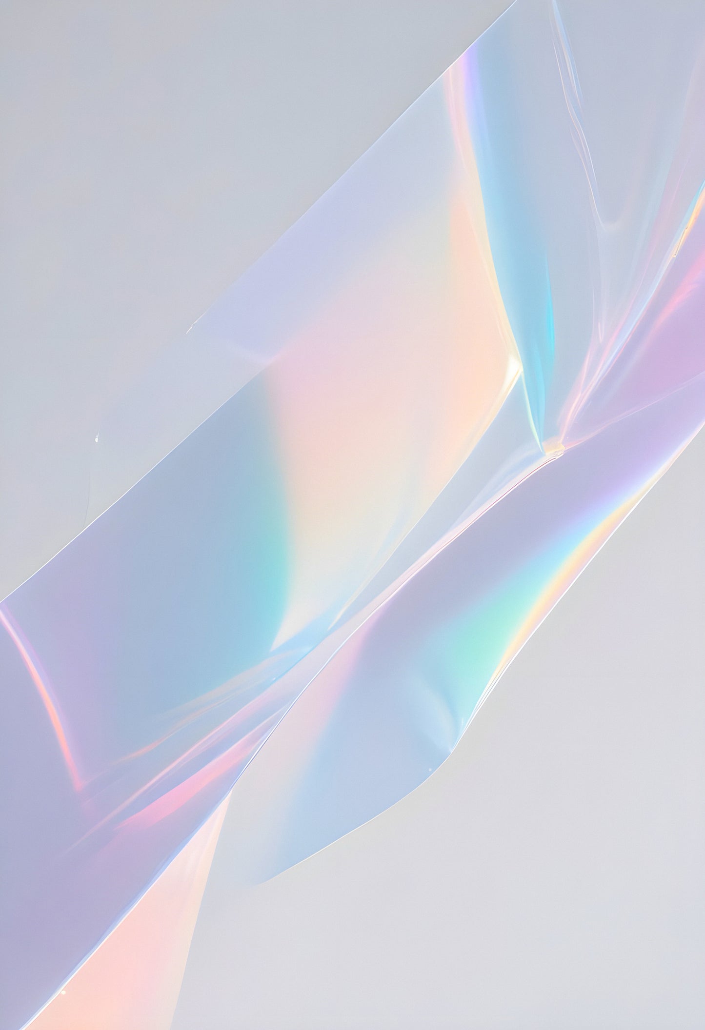 Shimmering holographic tape reflecting soft pastel colors on a light gray background