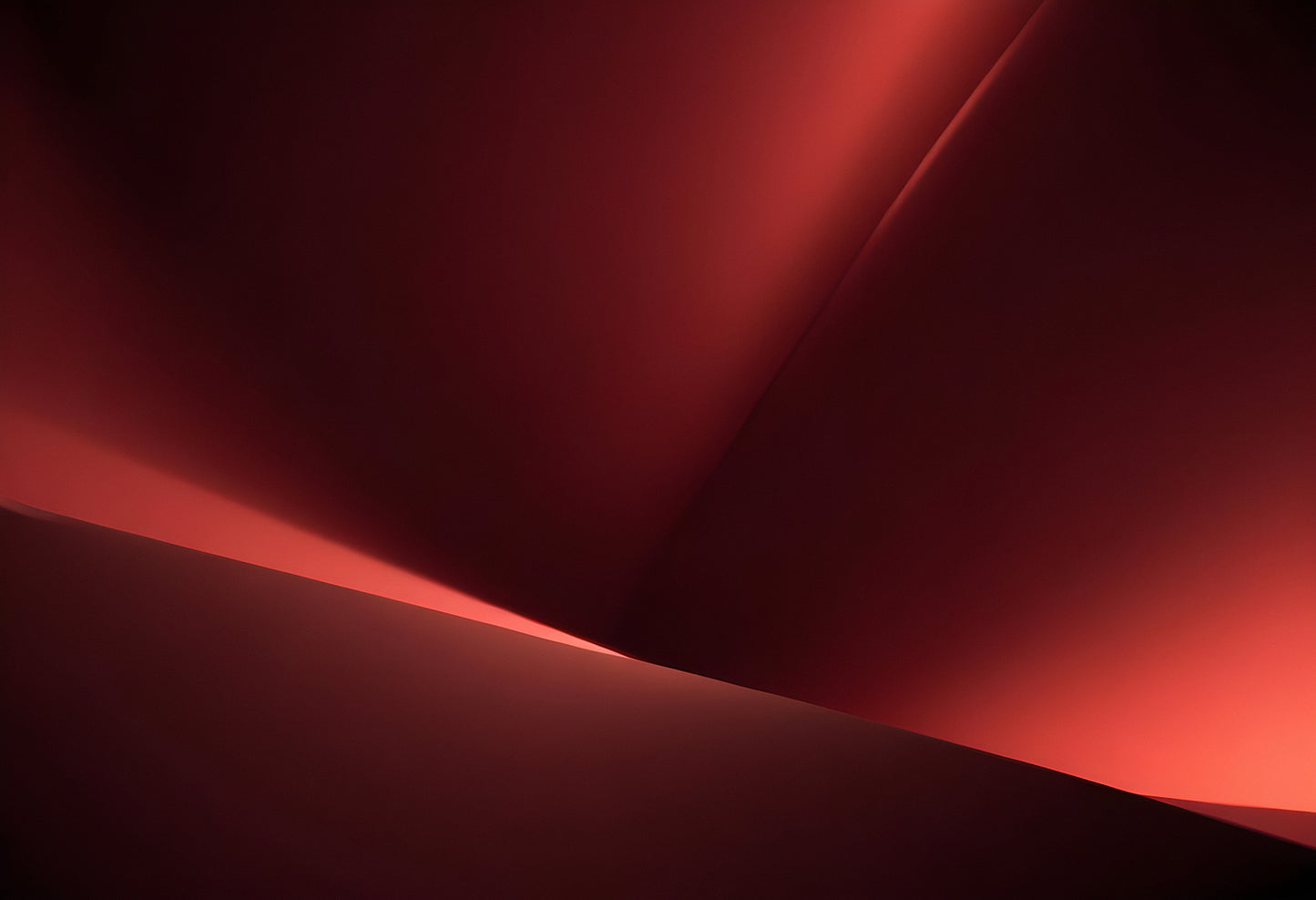 A soft glowing curve against a deep red background creates an abstract and calming visual experience in a minimalist setting