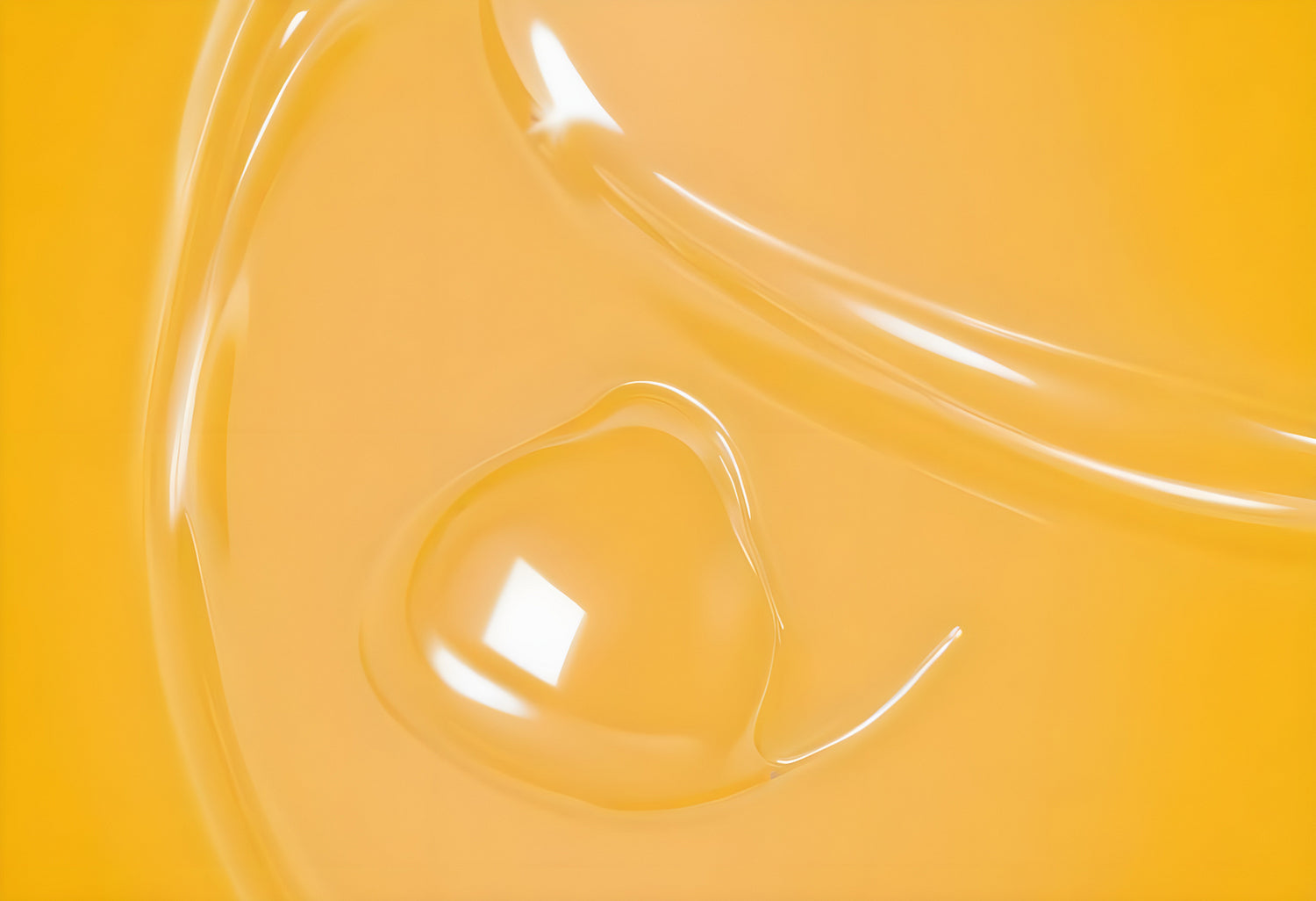 Translucent droplet on vibrant yellow surface showcasing intricate texture and light reflection