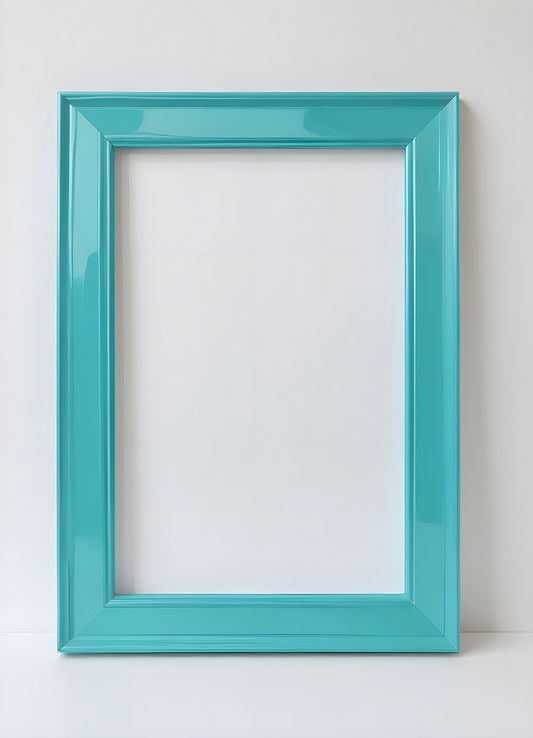 Bright turquoise picture frame placed against a white wall ready for display or decoration in a modern setting