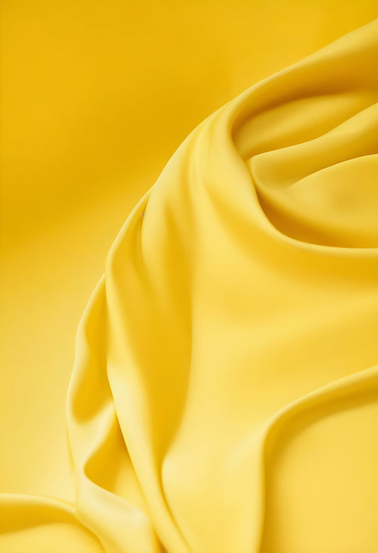 Golden satin fabric drapes elegantly with gentle waves under soft light. Generative AI