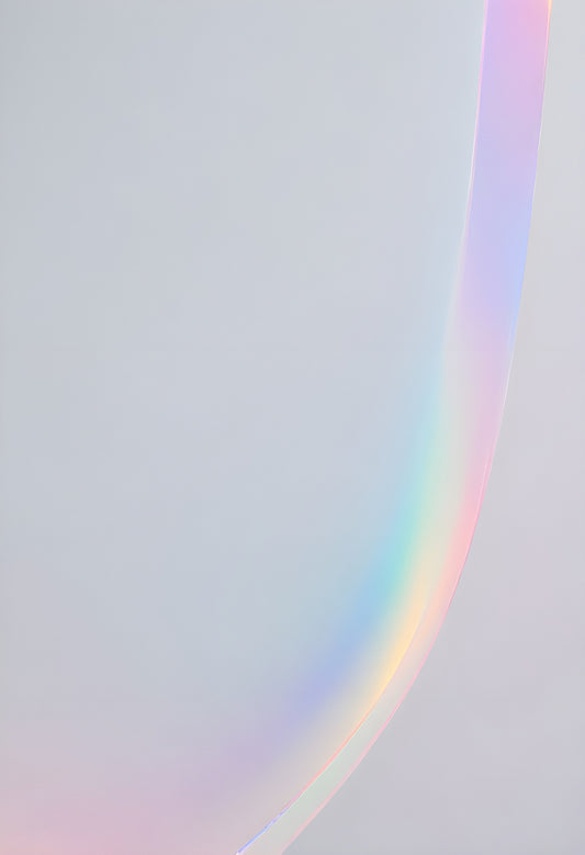 A soft pastel rainbow arching across a light gray background creates a serene and calming atmosphere during daylight