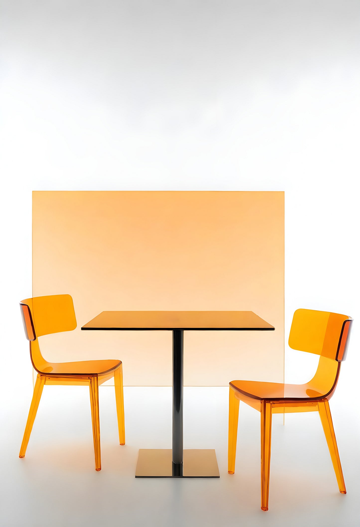 Modern orange dining set featuring sleek chairs and table against a minimalist backdrop