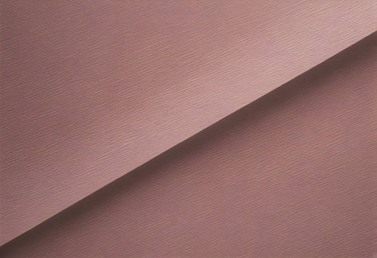 Softly textured mauve fabric draped elegantly on a surface