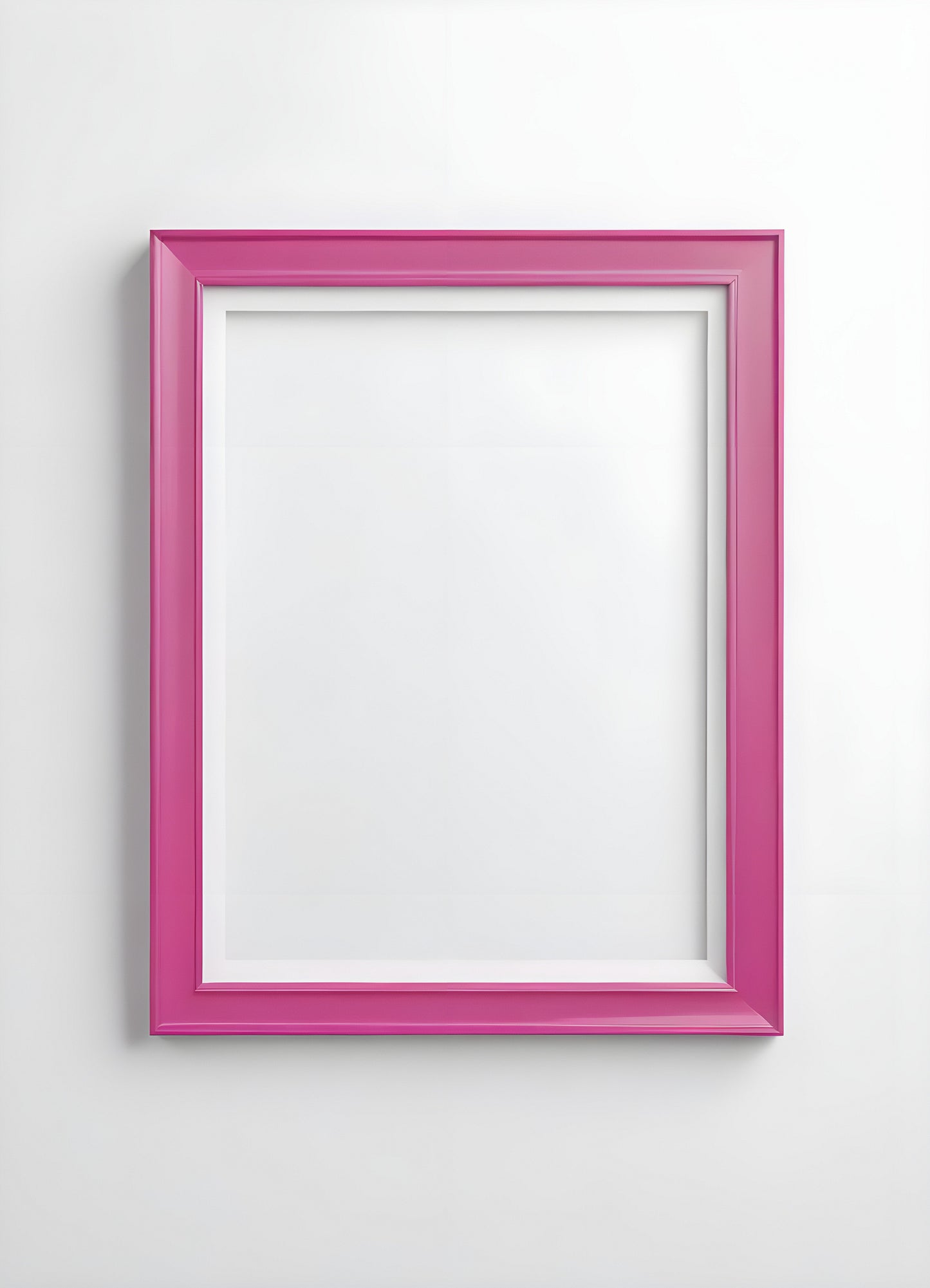 Bright pink empty frame stands against a white wall, inviting creativity and personal expression