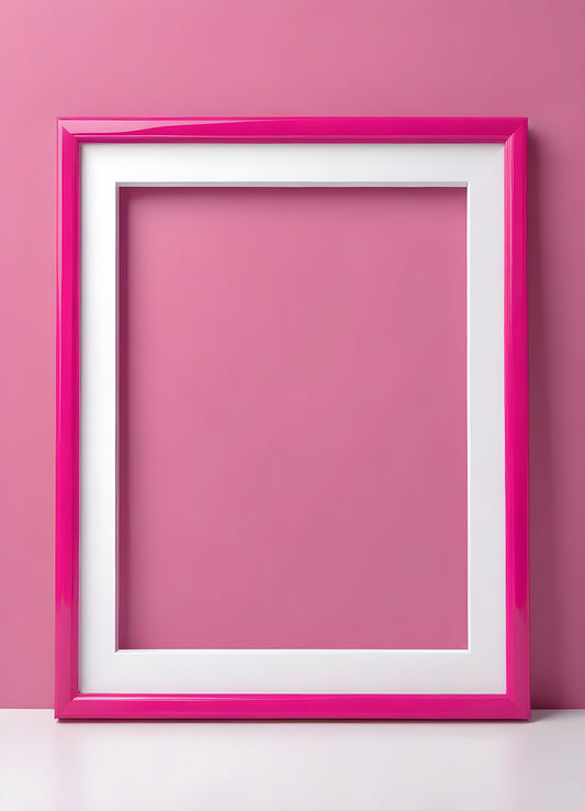 Bright pink empty frame stands against a white wall, inviting creativity and personal expression