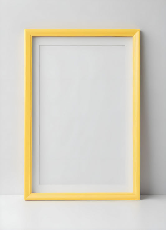 Empty yellow frame hanging on a light wall, perfect for a gallery of personal memories or artistic displays in a modern space