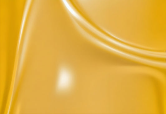 Close-up of a smooth, glossy yellow surface with curves and reflections, showcasing its vibrant color and texture under soft lighting. Generative AI