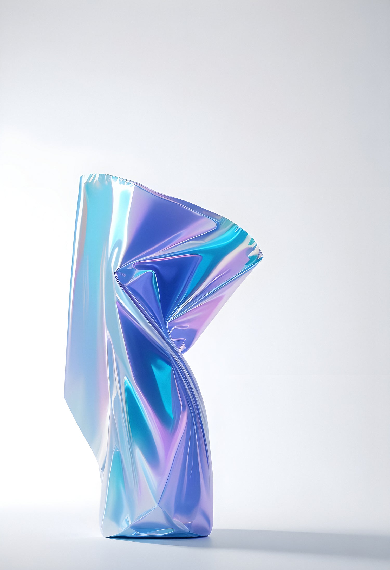 Shimmering iridescent foil sculpture displaying unique shapes against a bright background