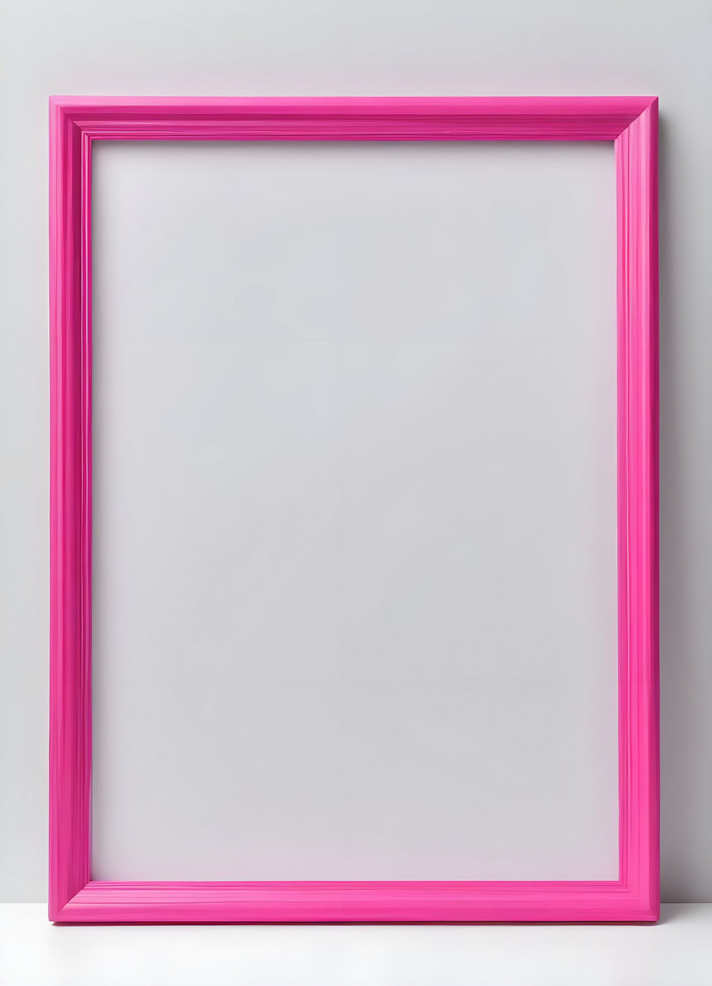 Bright pink empty frame stands against a white wall, inviting creativity and personal expression