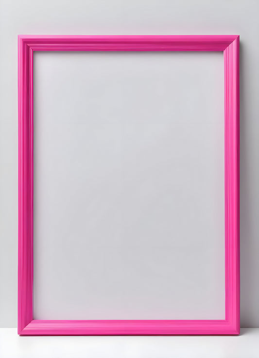 Bright pink empty frame stands against a white wall, inviting creativity and personal expression