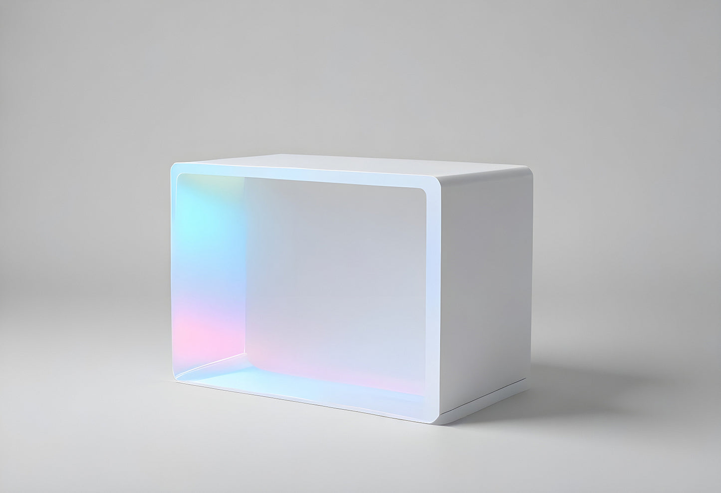 Minimalist white cube display with a soft gradient color effect observed under studio lighting conditions