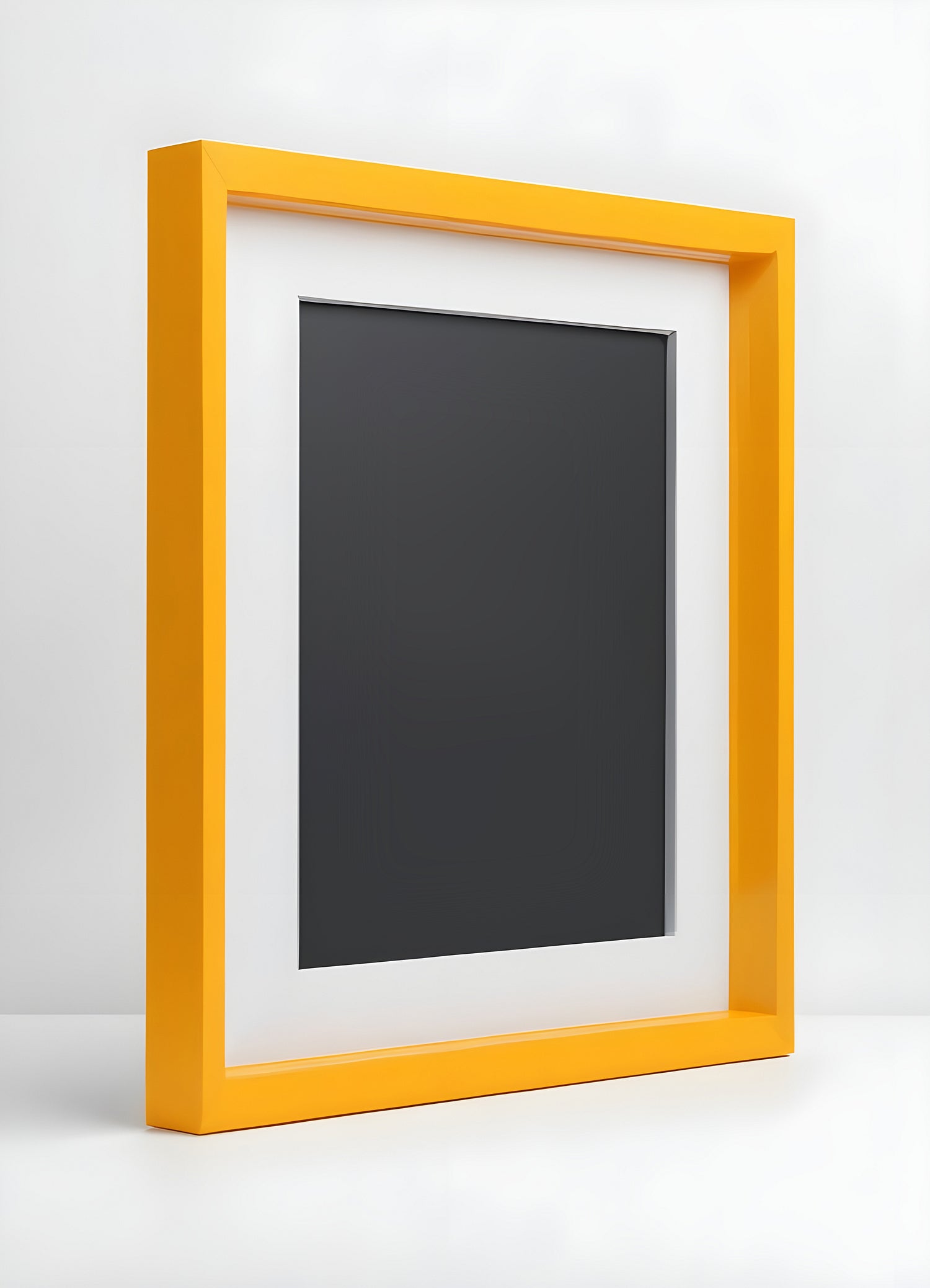 A vibrant yellow frame with a blank black canvas displayed on a minimalist background inviting creativity and artistic expression