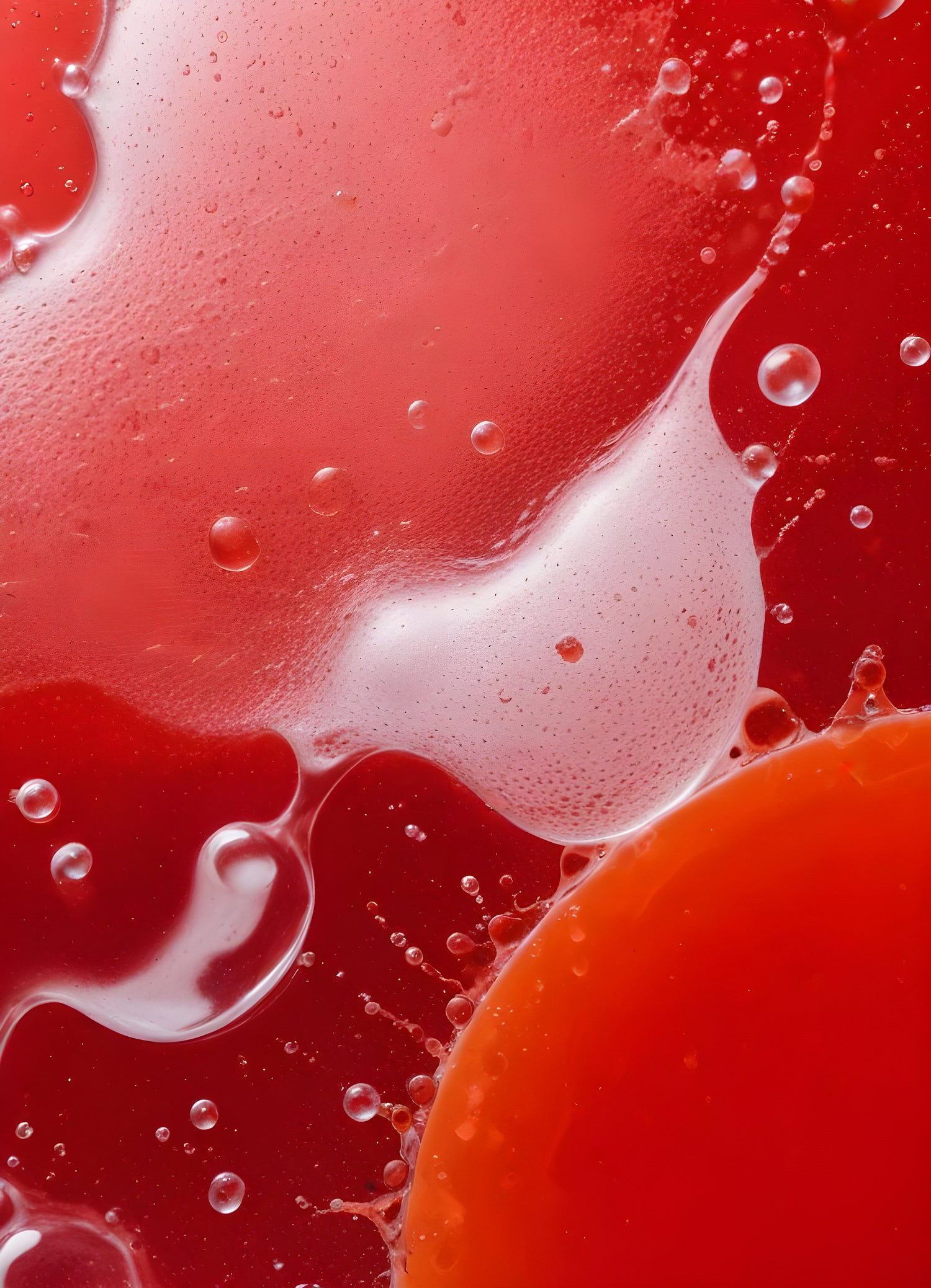 Abstract close-up of red liquid with bubbles and droplets, showcasing the interplay of colors and textures in a vibrant manner. Generative AI