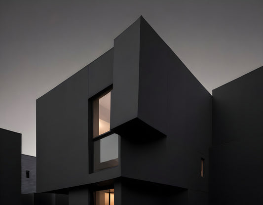 Modern architectural design featuring a black structure illuminated at dusk in an urban environment