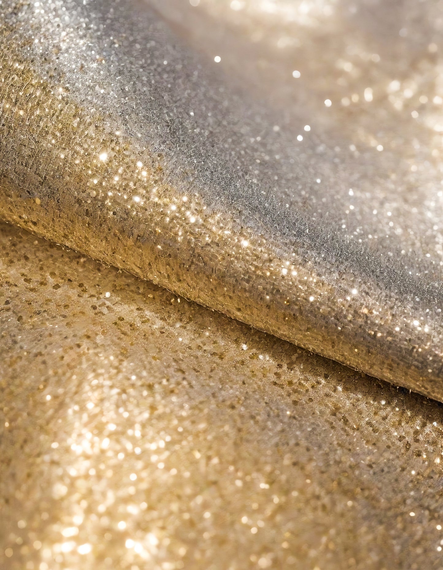 Sparkling golden fabric draping gracefully under soft light during a creative textile project