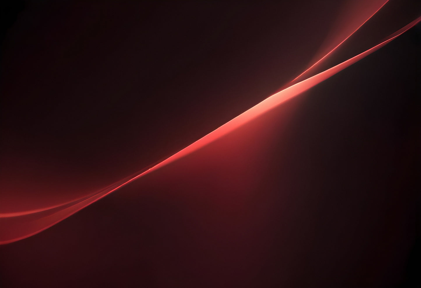 A soft glowing curve against a deep red background creates an abstract and calming visual experience in a minimalist setting