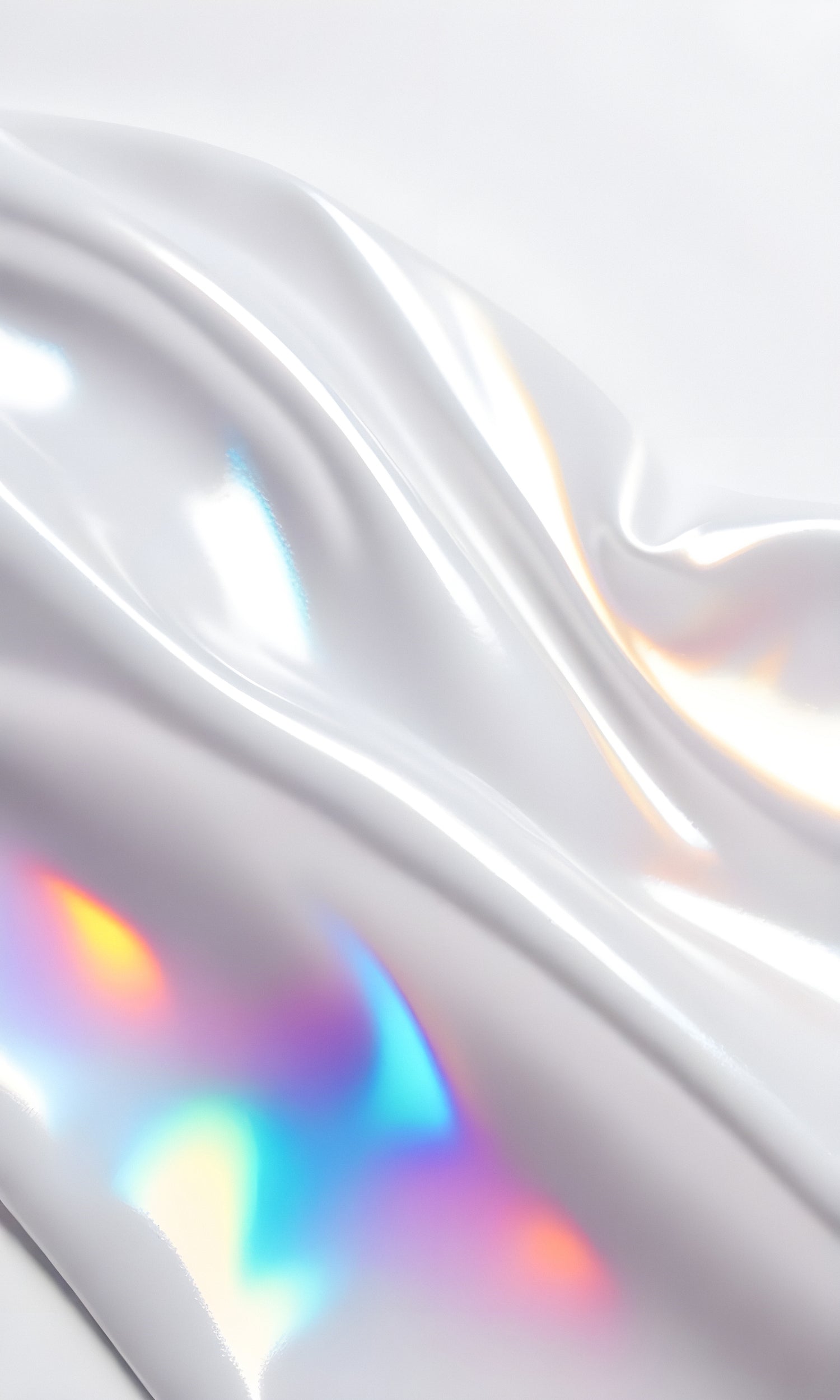 A close-up of shimmering waves in white with iridescent colors reflecting light in a smooth texture