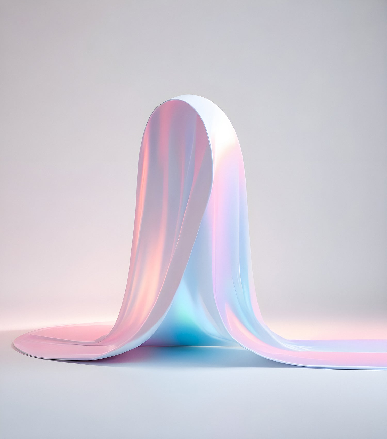 A soft pastel-colored flowing sheet creates a mesmerizing wave effect in a minimalistic studio setting during daylight