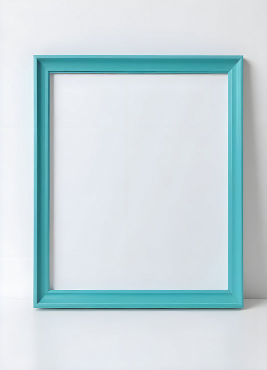 Empty turquoise picture frame displayed on a white wall ready for artwork in a modern interior setting