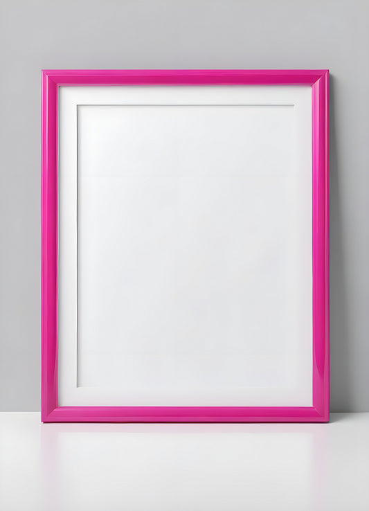 Bright pink empty frame stands against a white wall, inviting creativity and personal expression