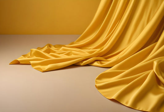 Soft yellow fabric drapes elegantly across a light-colored surface enhancing a bright and cheerful atmosphere. Generative AI