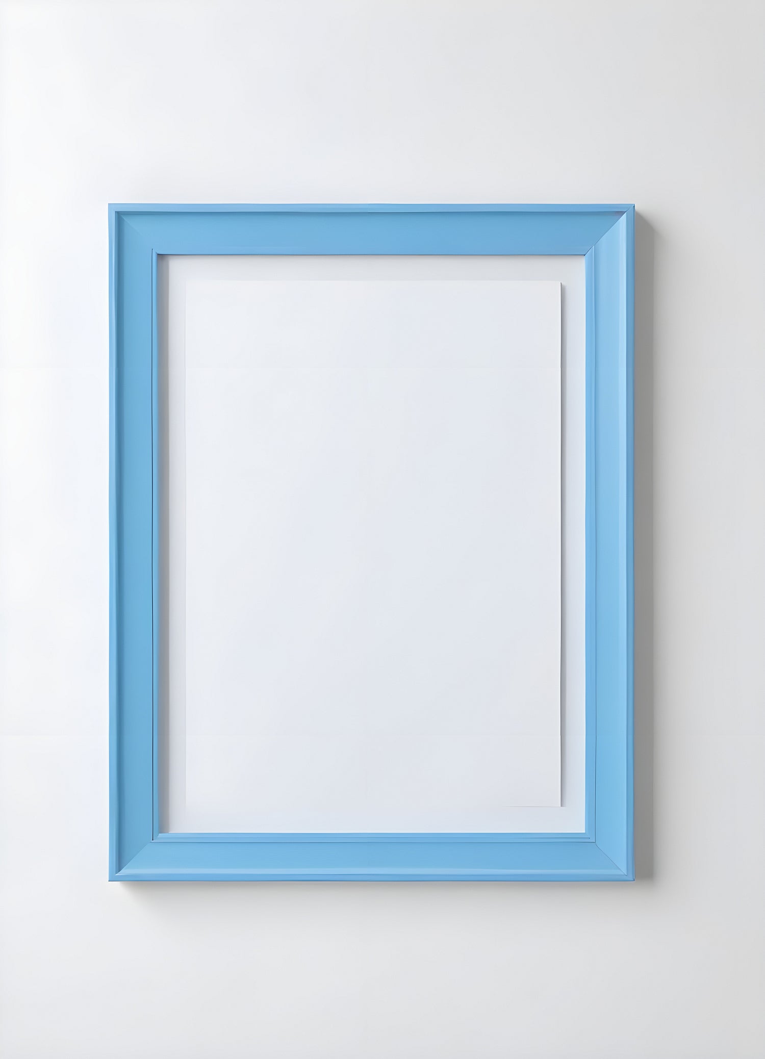 Empty framed blue canvas on a white wall in a minimalist design setting showcasing a modern artistic atmosphere