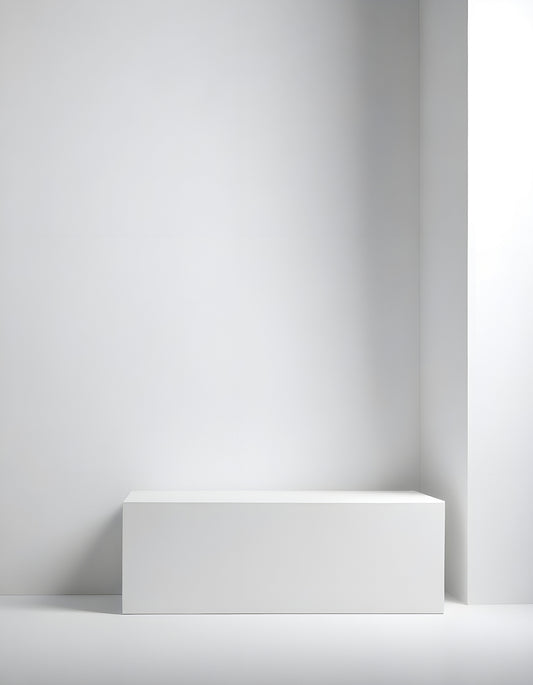 Minimalist white display box against a blank wall in a modern interior space