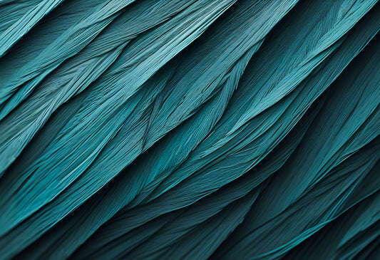 Textured teal paper layers in a flowing abstract arrangement