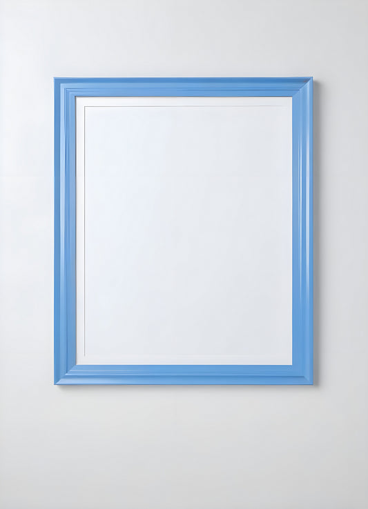 Empty framed blue canvas on a white wall in a minimalist design setting showcasing a modern artistic atmosphere