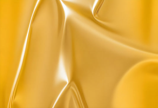 Golden satin fabric drapes elegantly with gentle waves under soft light. Generative AI