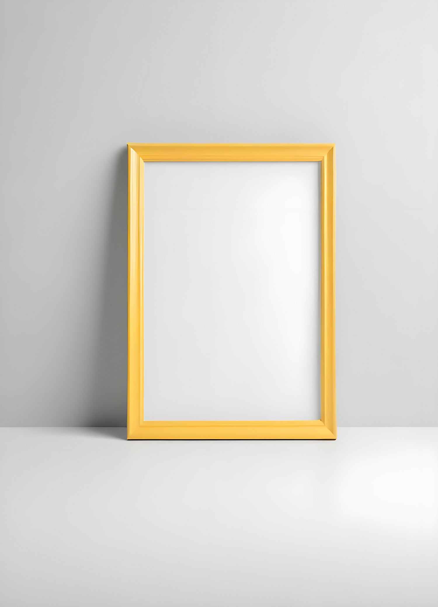 A bright yellow frame leaning against a simple white wall with a smooth surface and a minimalistic background